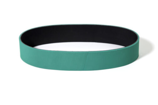 Correa de transmisión de elastómero y tejido